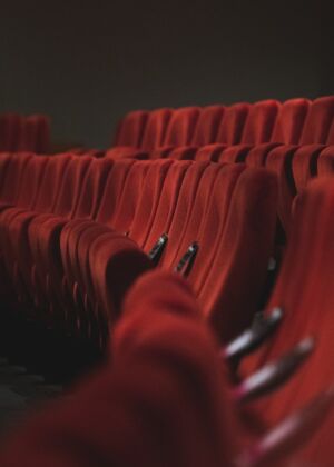 red fabric padded cinema chairs