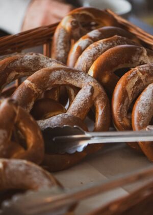 A basket full of pretzels sitting on top of a table