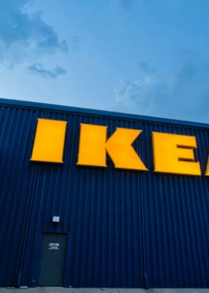 yellow and black building under white clouds during daytime