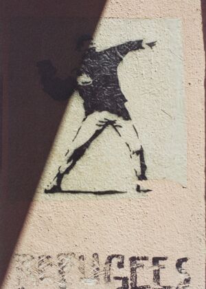 shadow of man on white wall