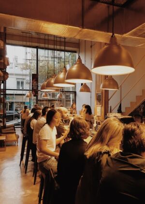 people sitting on chair inside room