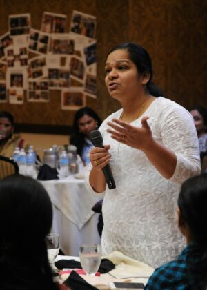 woman holding microphone