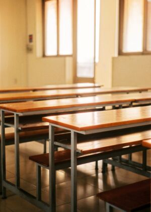 brown and gray wooden tables and chairs